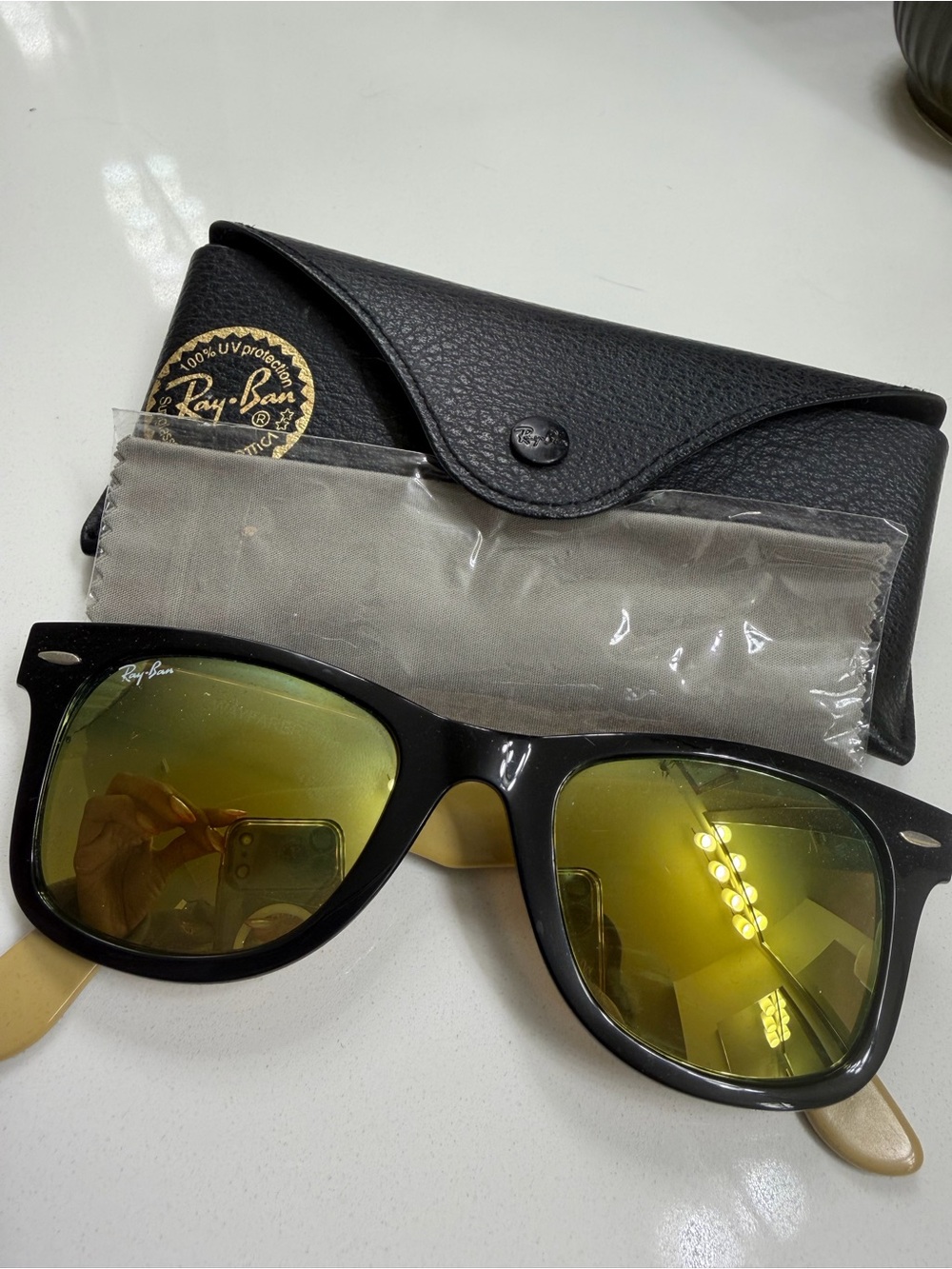 Ray-Ban Men’s Black Frame Sunglasses with Yellow Mirror Lenses